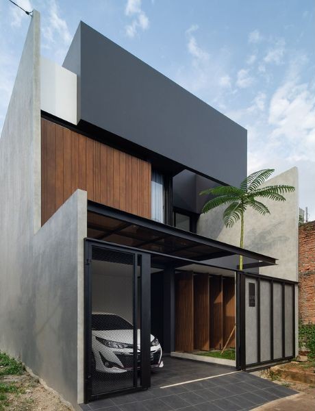 Rumah Industrial Modern dengan Taman Kecil